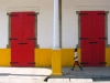 Haitian Boy & Red Doors